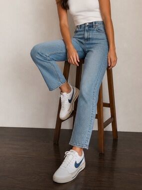 Retro Nike White Sneakers with Blue Swoosh